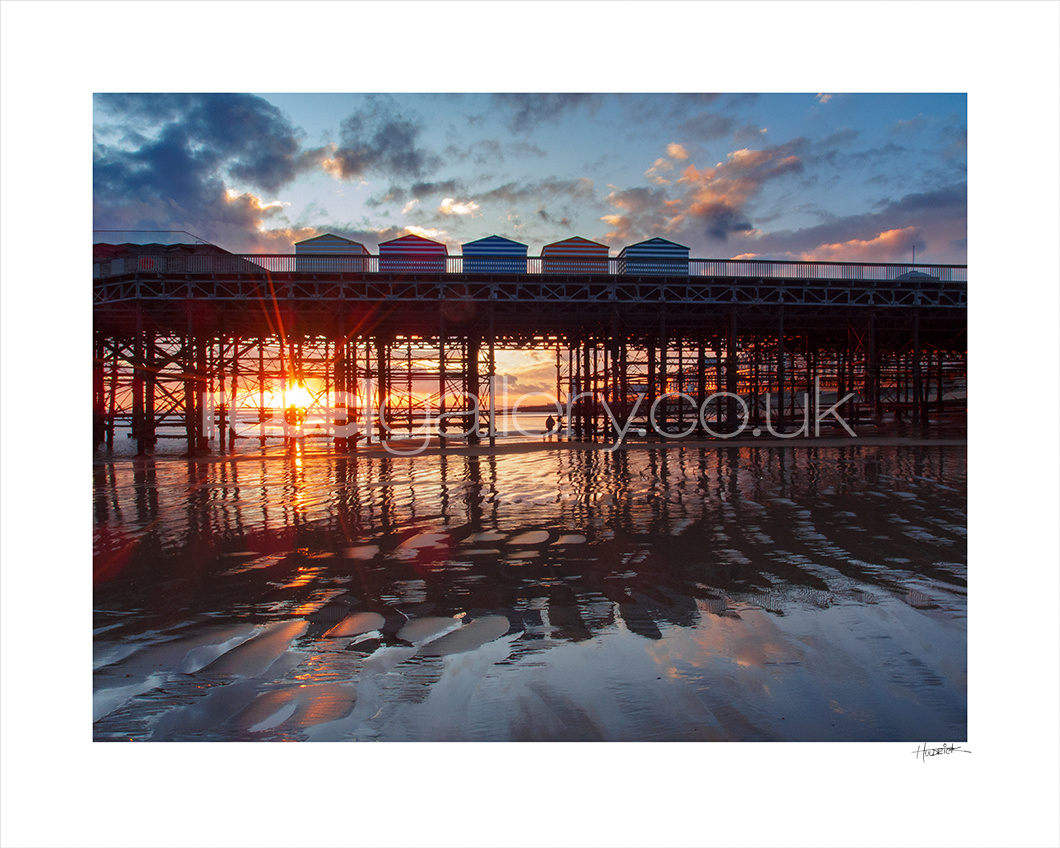 Photograph of Hastings Pier at sunset by Jon Huldrick Wilhelm.